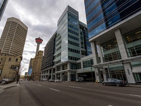 Pictured is a nearly deserted 9 Avenue S.W. in Downtown Calgary on Thursday, April 30, 2020. Azin Ghaffari/Postmedia