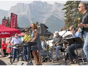 The Suzy Q band plays at the annual free pancake breakfast on Seventh Avenue for the Canmore Folk Music Festival.  photo by Pam Doyle/pamdoylephoto.com
