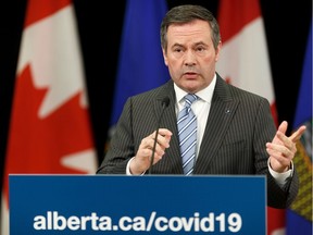 Premier Jason Kenney speaks about respecting truckers and the continuing impact of the COVID-19 coronavirus pandemic during a provincial briefing at the Federal Building in Edmonton, on Wednesday, April 1, 2020.
