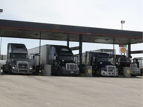Trucks gassing up at the Flying J Travel Centre in SE Calgary. Wednesday, April 8, 2020.