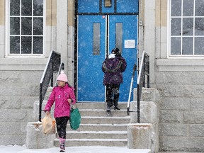 Students at Stanley Jones School in Calgary were allowed into gather books and belongings on Thursday, March 19, 2020.  Gavin Young/Postmedia