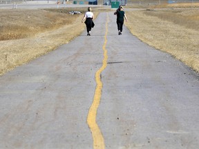 A pathway near the Calgary International Airport was a quiet place for a physical distancing walk during the COVID-19 pandemic on April 21, 2020.