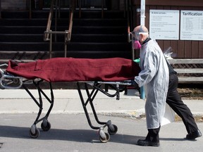A body is removed from Centre d'hebergement Yvon-Brunet, a seniors' long-term care centre, amid the outbreak of the coronavirus disease (COVID-19), in Montreal, Quebec, Canada April 18, 2020.