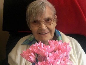 Rita Owen poses in this undated handout photo. Rita Owen died in a Calgary care home three weeks shy of her 92nd birthday never knowing she'd contracted COVID-19.