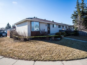 Police hold the scene of a suspicious death in a home in the 600 block of Marian Crescent N.E. in Calgary on Tuesday, April 28, 2020.