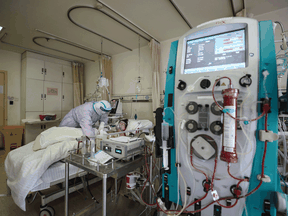 A COVID-19 patient receives extra-corporeal membrane oxygenation (ECMO) treatment at the Red Cross hospital in Wuhan, China.