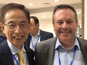 Jason Kenney (R) with Martin Lee.
