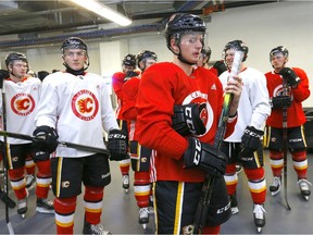 Calgary Flames, Emilio Pettersen and gang get ready to hit the ice during the Flames annual development camp at WinSport Canada in Calgary on Saturday, July 6, 2019.