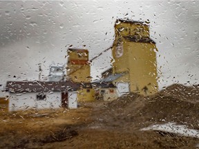 A rainy mosaic of the grain elevators at Mossleigh, Ab., on Tuesday, April 14, 2020. Mike Drew/Postmedia