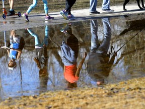 As temperatures warm up pathways are getting busy like Confederation Park making social distancing harder in Calgary on Monday, April 20, 2020. Darren Makowichuk/Postmedia