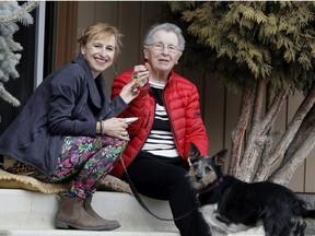 Suzanne Presinal, her mother Alice Dombroski and three-legged dog Devi are seen outside their SE Calgary home. Preinal was a teacher at STEM Learning Lab but got laid off. Preinal has become proactive about how she spends money and uses things during the COVID-19 pandemic. Friday, April 17, 2020. Brendan Miller/Postmedia