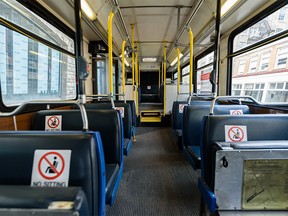 Photographed are seats inside a Calgary Transit bus that has been marked in order to implement physical distancing on Thursday, April 30, 2020.
