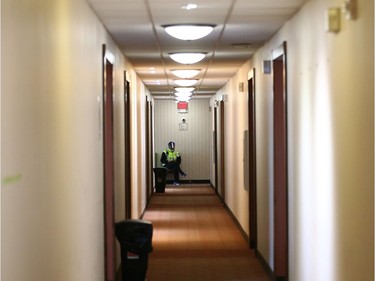 A security guard wearing PPE mans each hotel entrance at the assisted self isolation hotel in Calgary on Thursday, May 7, 2020. Postmedia has agreed not to reveal the exact location of the hotel. Jim Wells/Postmedia