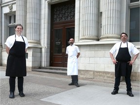 L-R--Teatro restaurant staff Tracie Zavich, Matthew Batey and Alex Kuto pose in front of the Stephen Ave Walk restaurant in downtown Calgary on Saturday, May 16, 2020. The restaurant donated food to charity after not being allowed to open recently.