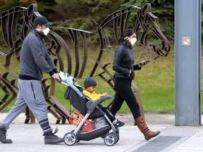 A steady flow of people enter the Calgary Zoo as it opened in Calgary on Saturday, May 23, 2020.