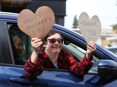 Family members created a Mother's Day parade of cars for their moms and grandmothers at the Amica Britannia seniors residence in Calgary on Sunday, May 10, 2020.