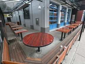 The outdoor patio tables at Lulu Bar on 17th in Calgary on Tuesday, May 12, 2020. Calgary restaurants and bars will not be permitted to reopen on the original target date of May 14.