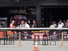 Lunch hour business was brisk at the Trolley 5 restaurant in Calgary on Monday, May 25, 2020. After about two months Calgarians can sit down again in restaurants with COVID-19 precautions.