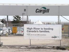 A sign is shown outside the Cargill facility in High River, AB, south of Calgary on Wednesday, May 6, 2020. After being the epicentre of one of the province's worst COVID-19 outbreaks last year, the High River plant is again reporting a coronavirus outbreak.