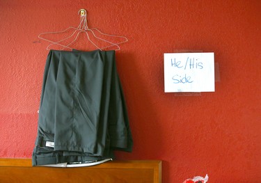 A pair of men's pants hangs in the clothing donation storage room at the assisted self isolation hotel in Calgary on Thursday, May 7, 2020. Postmedia has agreed not to reveal the exact location of the hotel. Jim Wells/Postmedia