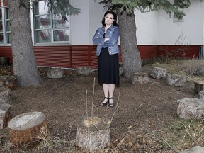 Kristin Dahl, Principal of Glendale School, poses in the schools outdoor amphitheatre area. An overnight theft of the schools stumps and stools has left staff and students upset. Some community members have donated tree stumps to the school in hopes of rebuilding the outdoor amphitheatre area.  Monday, May 11, 2020.