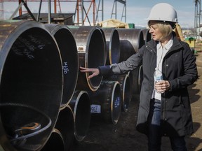 Alberta NDP Leader Rachel Notley visits an oil and gas pipe fabrication plant in Calgary, Alta., Monday, April 15, 2019. Alberta's Official Opposition leader says Premier Jason Kenney should step in to reverse a decision from the province's energy regulator to suspend environmental monitoring requirements.