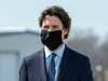 Prime Minister Justin Trudeau wears a protective face mask as he attends a repatriation ceremony at CFB Trenton for the six Canadian Forces personnel killed in a military helicopter crash, May 6, 2020.