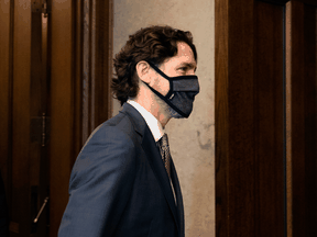 Prime Minister Justin Trudeau arrives in the foyer of the House of Commons on Parliament Hill for a meeting of the Special Committee on the COVID-19 Pandemic in Ottawa, on May 27, 2020.