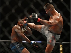 Alistair Overeem (red gloves) fights Walt Harris (blue gloves) during UFC Fight Night at VyStar Veterans Memorial Arena in Jacksonville, Fla., on May 16, 2020. Jasen Vinlove/USA TODAY Sports
