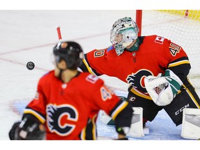 Calgary Flames prospect Dustin Wolf makes a save against the Edmonton Oilers during Battle of Alberta prospects game in Calgary at Scotiabank Saddledome on  Sept. 10, 2019. Al Charest/ Postmedia