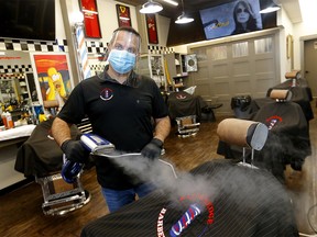 Rico (Jalal El-Saghir) owner of the Razors Edge Barber Shoppe is prepared to open up this week due to COVID-19 supplying masks and sanitizer as well as steam sanitizing clients in Calgary on Monday, May 11, 2020.