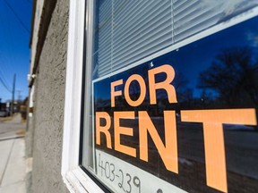 A for rent sign is seen outside a house in the community of Sunnyside in Calgary on Thursday, March 26, 2020.