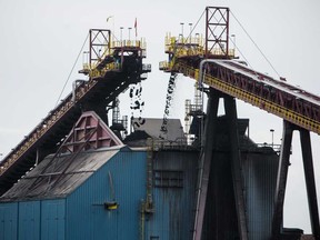 Oil sand is brought to a crushing unit during a grand opening event for the Suncor Fort Hills oil-sands extraction site near Fort McKay, Alberta.