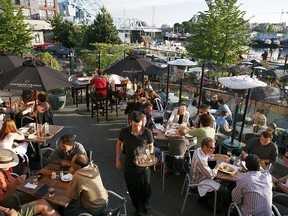 Outdoor patio at Victoria's Canoe Club, before the COVID-19 pandemic.