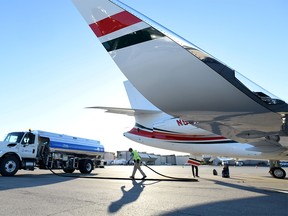 FILE PHOTO: A business jet is refuelled in Las Vegas, Nevada, U.S. October 21, 2019.