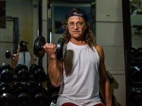 Prominent personal trainer Pete Estabrooks poses for a photo in his gym in southwest Calgary on Tuesday, June 9, 2020.