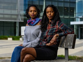 Sisters Sinit, left, and Semhar Abraha pose for a photo outside Taylor Family Library on Wednesday, June 10, 2020.