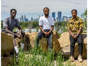 Mount Royal Cougars student-athletes Godi Jibi, left, Orest Ndabaneze, and Patson Choebefu pose for a photo on Thursday, June 25, 2020. Ndabaneze along with 15 MRU Cougars student-athletes have written a letter demanding support from the institution's higher authorities in fighting racism.