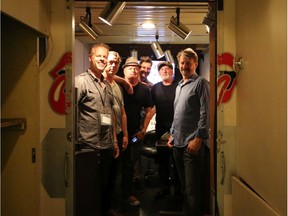 Glenn Dixon, Richard Maruk, Darren Stinson, National Music Centre engineer Jason Tawkin, Michael Dangelmaier and Jim Sarantis at the Rolling Stones Mobile Studio at Studio Bell. The musicians, from Calgary's Barrel Dogs, recorded with Tawkin using the studio to record the soundtrack to Dixon's upcoming debut novel. Picture by Desiree Bilon.