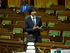 Prime Minister Justin Trudeau rises during a meeting of the Special Committee on the COVID-19 Pandemic in the House of Commons on Parliament Hill in Ottawa, on Tuesday, June 9, 2020.