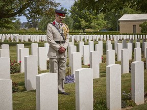 Colonel Howard Wilkinson stands amongst the graves at the Bayeux War Cemetery during commemorations for the 76th Anniversary of the D-Day landings on June 06, 2020 in Bayeux, France. Due to Covid-19 travel restrictions this is the first time in 75 years that veterans have not been able to attend the Anniversary with many events cancelled.