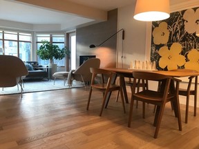 The dining area in a recently updated Jeremy Sturgess designed infill from the 1980s in West Hillhurst.
