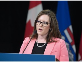 Minister of Children's Services Rebecca Schulz speaks during a news conference in the Edmonton Federal Building on Tuesday, April 21, 2020.