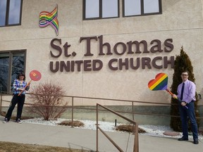 Rev. Tracy Robertson (left) stands outside of St. Thomas United Church in northwest Calgary with Rev. Justin McNeill as their church remains closed during the COVID-19 pandemic.