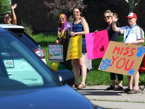 Teachers and staff at Chris Akkerman Elementary School in northeast Calgary were missing their students so on the last day of school, Thursday, June 25, 2020, they lined up outside the school and invited students to drive by to say good-bye.