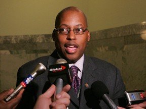 Lindsay Blackett speaks to reporters at the Alberta legislature on March 12, 2008, after being appointed to the Stelmach government's cabinet. Our hope for lasting change lies with young people, he says in a column.