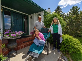 Margaret and Mark Anderson and daughter Hannah  outside their house in Woodbine on Thursday, June 4, 2020. Margaret says their neighbourhood is being crowded out by ring road construction.