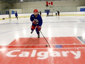 Athletes from the Breakaway Hockey School hit the ice at the Henry Viney Arena in Calgary as arenas are starting to open up on Monday, June 29, 2020.