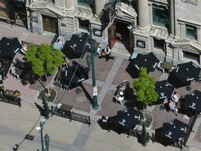 The Stephen Avenue Mall patio of the James Joyce Irish Pub & Restaurant is seen from the Calgary Tower on Thursday, June 11, 2020.
