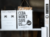 A sign on a Toronto business’s door states ‘CEBA won’t save us’ during the COVID-19 pandemic.